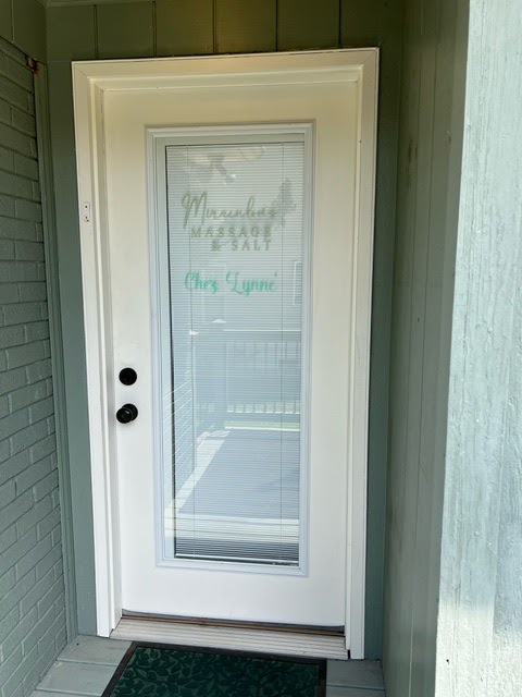 The entrance door at Suite 102C